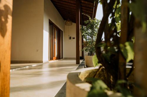 Кровать или кровати в номере Naraja Villa II