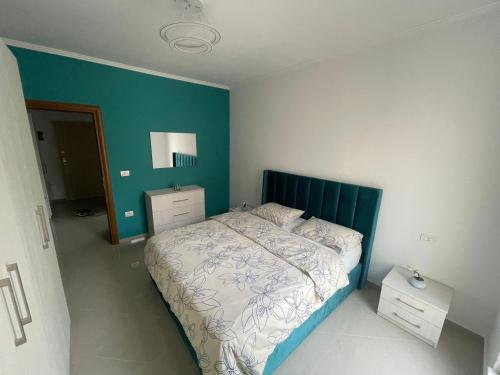Ένα ή περισσότερα κρεβάτια σε δωμάτιο στο FRAAL Apartments