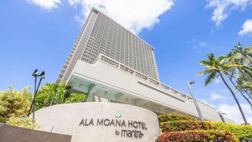 a building with a sign in front of aania mountain hotel at Studio with Partial Ocean View & Balcony Unit 1901 in Honolulu