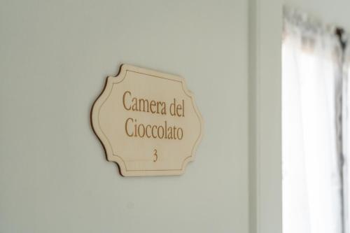 a sign on a door with the words cancer cell chemotherapy at Consi's House - ItalyWeGo in Torgiano