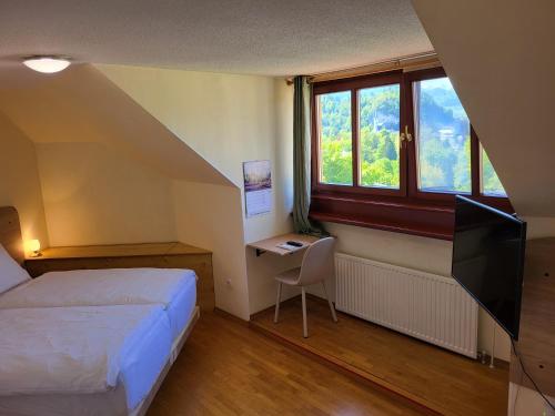 Postel nebo postele na pokoji v ubytování Apartment Alpine Lake