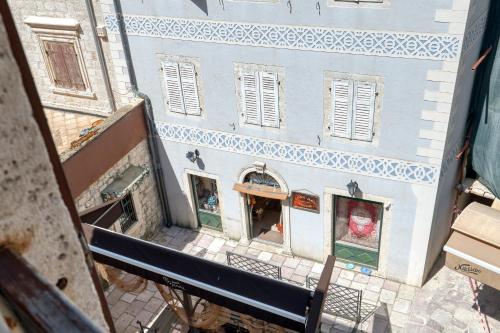 an overhead view of a building in a street at Hotel Rendez Vous in Kotor