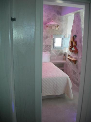 Starlight Luxury Seaside Villa & Suitesにあるベッド