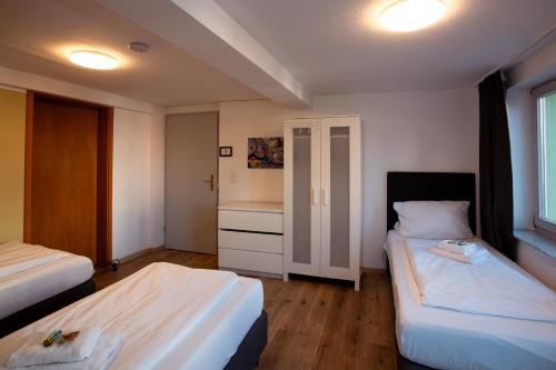Haus99 Budget Pension & Apartmentsにあるベッド