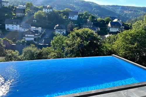 Πισίνα στο ή κοντά στο Alte Försterei - Luxus-Fewo JÄGERHEIM mit Pool & Sauna