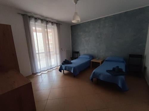 Cama o camas de una habitación en Quercia Marina