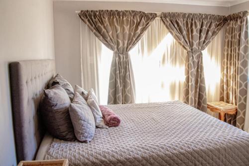 Postel nebo postele na pokoji v ubytování PPM BnB