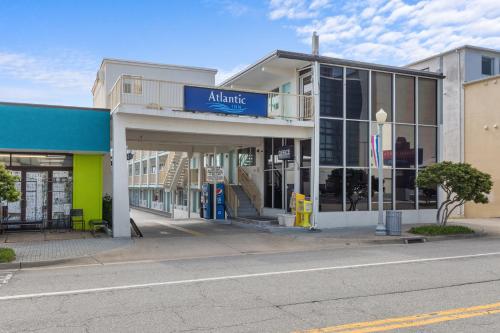 an empty street in front of an atlantic store at Atlantic Inn in Virginia Beach