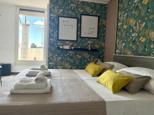 Postel nebo postele na pokoji v ubytování Casa Giuliani