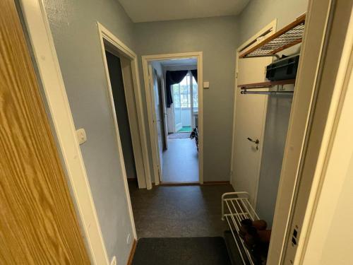 a hallway with a hallway leading to a room at The castle & stay in Örebro