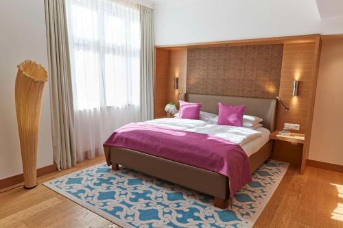 Katil atau katil-katil dalam bilik di Vier Jahreszeiten Kempinski München