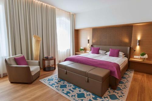 Katil atau katil-katil dalam bilik di Vier Jahreszeiten Kempinski München