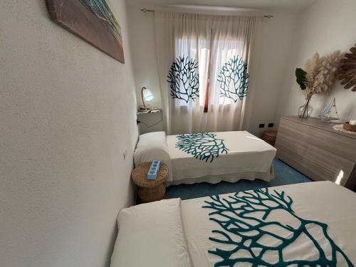 Postel nebo postele na pokoji v ubytování Ilfe House