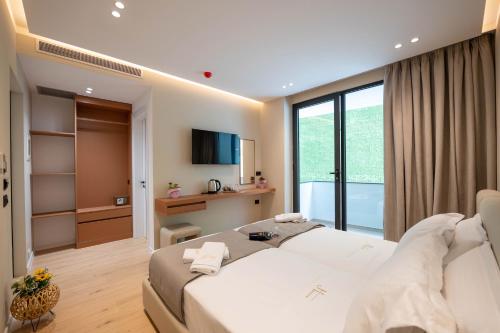 Jako Premium Hotelにあるテレビまたはエンターテインメントセンター
