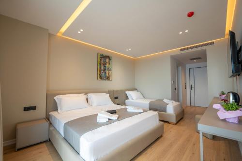 Jako Premium Hotelにあるベッド
