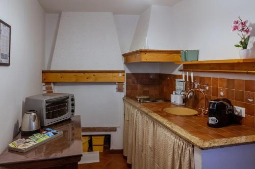 Kuchyň nebo kuchyňský kout v ubytování Casa Vacanze Enzo Capoliveri