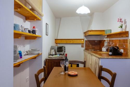 Kuchyň nebo kuchyňský kout v ubytování Casa Vacanze Enzo Capoliveri