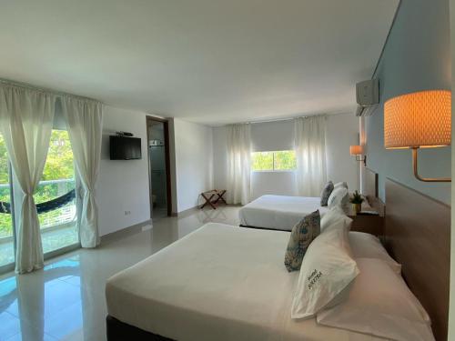 Postel nebo postele na pokoji v ubytování Hotel Soleira