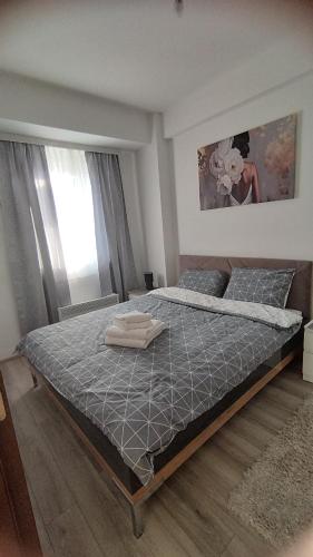 Ένα ή περισσότερα κρεβάτια σε δωμάτιο στο Apartman Kamelia