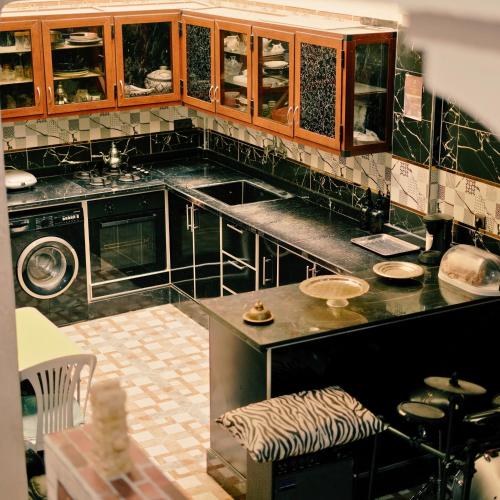 Dapur atau dapur kecil di Guest house DARNART Hostel