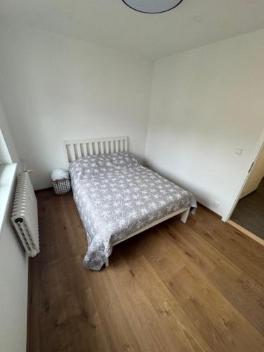 Postel nebo postele na pokoji v ubytování Apartmán Loket