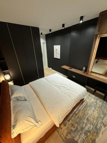 Katil atau katil-katil dalam bilik di Hils Hotel Apartment by Warm