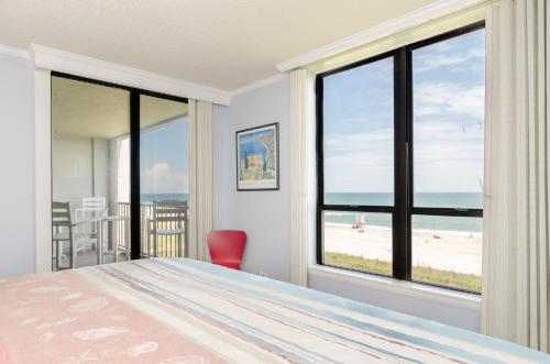 Voodi või voodid majutusasutuse Paradise by Bryant Real Estate toas