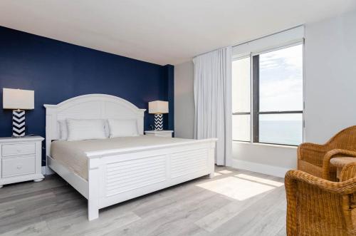 Voodi või voodid majutusasutuse Isle Be Back by Bryant Real Estate toas