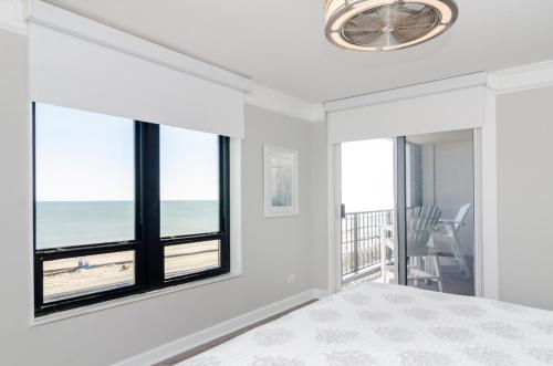 Voodi või voodid majutusasutuse 6C by the Sea by Bryant Real Estate toas