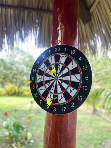 a dart board is attached to a pole at Hotel Boutique Victoria in Moyogalpa