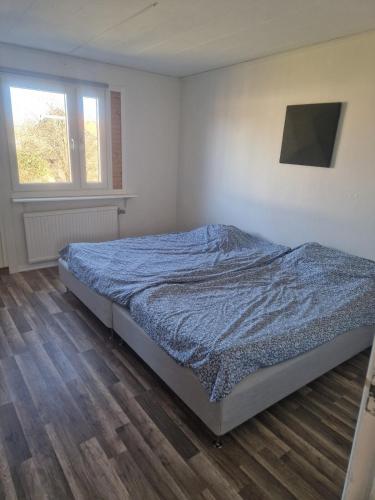 Postel nebo postele na pokoji v ubytování Bellas House