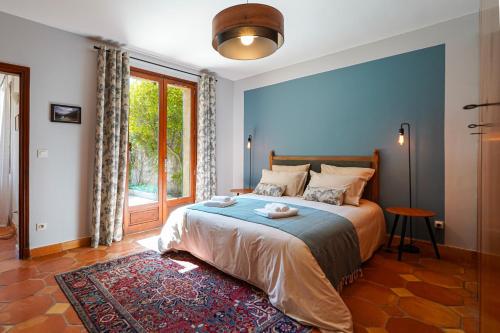 Ένα ή περισσότερα κρεβάτια σε δωμάτιο στο Villa Helene