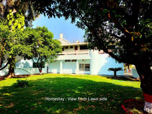 a view of the house from the yard at Ved Homestay in Dehradun