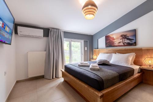 Katil atau katil-katil dalam bilik di September15 Suites, Amfilochia