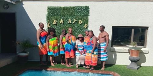 a group of people in life jackets standing next to a pool at Lerato's in Vanderbijlpark