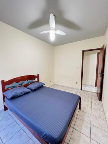 Ένα ή περισσότερα κρεβάτια σε δωμάτιο στο Cobertura Duplex Prainha