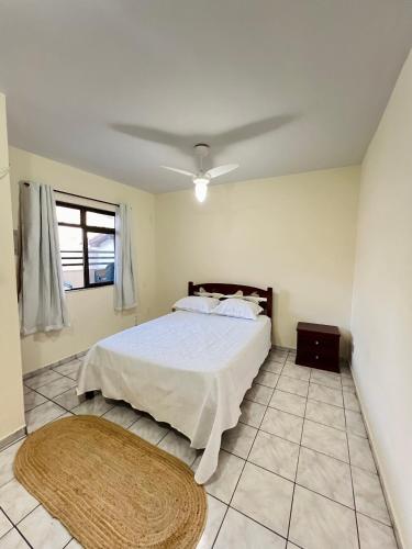 Ένα ή περισσότερα κρεβάτια σε δωμάτιο στο Cobertura Duplex Prainha