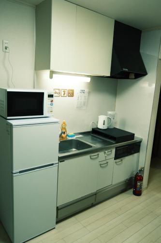 Köök või kööginurk majutusasutuses MEME Hotel