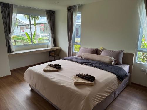 Postel nebo postele na pokoji v ubytování Terraza Lamai Modern One Bedroom Apartment with Pool & Terrace