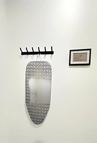 a close up of a skateboard on a wall at Pretty Private Room, near the Airport - Free parking - 01 in Miami