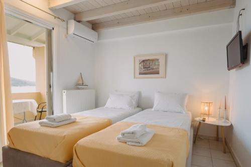 Katil atau katil-katil dalam bilik di Selene Seaside Apartment