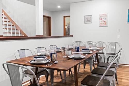 a dining room with a table and chairs at Spacious Game Room Seclusion Hot Tub and more in Long Pond