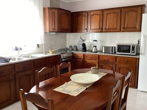Kuchyň nebo kuchyňský kout v ubytování Casa das Cales - Grande