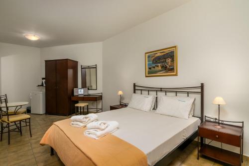 A bed or beds in a room at Livanios Studios