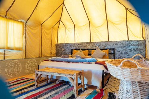 Postel nebo postele na pokoji v ubytování Tinfou desert camp