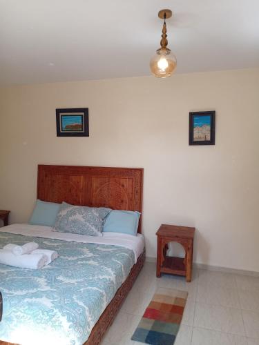 Postel nebo postele na pokoji v ubytování chambre privée avec terrasse