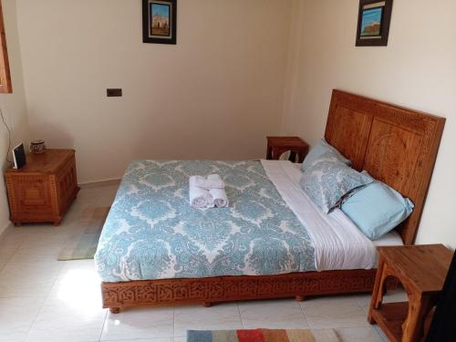 Postel nebo postele na pokoji v ubytování chambre privée avec terrasse