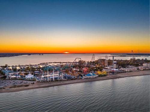 an aerial view of a amusement park at sunset at The 419 Ten-room Boutique In Sandusky in Sandusky