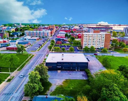 an aerial view of a city with buildings and a street at The 419 Ten-room Boutique In Sandusky in Sandusky