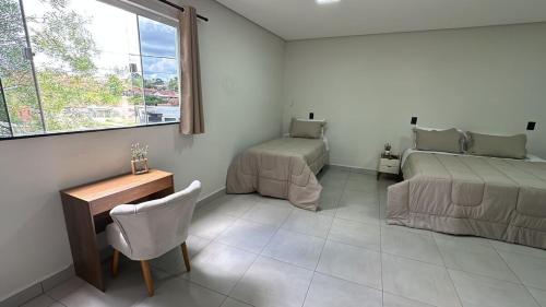 Postel nebo postele na pokoji v ubytování Studio novo em Pardinho